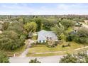 Spacious home situated on a large lot with lush green surroundings at 13721 Mill Pl, Odessa, FL 33556