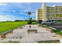 Outdoor seating area with string lights, perfect for relaxing at 5915 Sea Ranch Dr # 501, Hudson, FL 34667