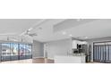 Modern kitchen with stainless steel appliances and white cabinets at 5925 Seaside Dr, New Port Richey, FL 34652