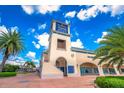 Ellenton Premium Outlets exterior view; tan building with blue accents at 10135 Zennia Ln, Parrish, FL 34219