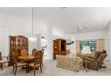 Bright dining room with a wooden table and hutch at 410 Candlestone Ct, Spring Hill, FL 34609