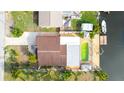 Aerial view of the house, highlighting the pool and canal access at 7304 Sheepshead Dr, Hudson, FL 34667