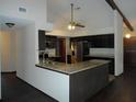 Kitchen with granite countertops and stainless steel appliances at 18623 Firethorn Dr, Spring Hill, FL 34610
