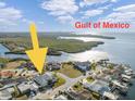 Aerial view of waterfront home near the Gulf of Mexico at 3912 Rudder Way, New Port Richey, FL 34652