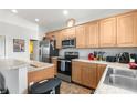 Well-equipped kitchen with stainless steel appliances, granite countertops, and ample cabinet space at 4045 Centavo Ct, Hernando Beach, FL 34607