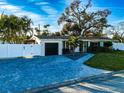 Newly renovated home with a large backyard and new landscaping at 4292 Maple Ne St, St Petersburg, FL 33703