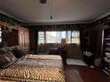 Bright bedroom with large window, cozy bed, hardwood floor and good storage at 30 Turner St # 208, Clearwater, FL 33756