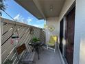 Cozy balcony with outdoor seating and decor at 12408 Eagleswood Dr # B, Hudson, FL 34667