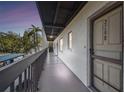 Building exterior showcasing a well-maintained walkway leading to unit 2208, enhancing curb appeal at 5640 Ferguson Ct # 2208, New Port Richey, FL 34652