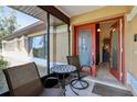 Charming front porch area with seating, perfect for relaxing outdoors at 1358 Newhope Rd, Spring Hill, FL 34606
