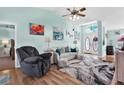 Bright living room boasts a vaulted ceiling and ample natural light creating a cozy and inviting atmosphere at 2334 Gimlet, Spring Hill, FL 34608