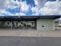 Exterior view showing the covered carport, offering convenient parking at 3233 Teeside Dr, New Port Richey, FL 34655