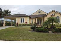 Beautiful one-story home with a carport and landscaped yard at 4415 Barracuda Dr, Bradenton, FL 34208