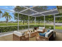 Relaxing screened patio overlooking a golf course at 5923 43Rd W St, Bradenton, FL 34210