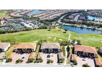 Aerial view of condo community near golf course at 12720 Sorrento Way # 102, Bradenton, FL 34211