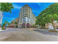 Building exterior showcasing modern architecture and landscaping at 100 Central Ave # H716, Sarasota, FL 34236