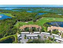 Luxury condo community with golf course and water views at 7607 Grand Estuary Trl # 205, Bradenton, FL 34212