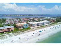 Aerial view of beachfront property showing building and beach at 1900 Gulf N Dr # 4, Bradenton Beach, FL 34217