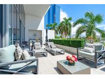 Spacious patio with comfortable seating and city views at 1155 N Gulfstream Ave # 208, Sarasota, FL 34236