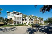 Two-story building with multiple units and balconies at 4802 51St W St # 205, Bradenton, FL 34210