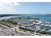 Aerial view of a marina with many boats and a waterfront park at 33 S Gulfstream Ave # 1007, Sarasota, FL 34236