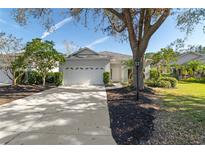 Single story home with attached garage and manicured landscaping at 6427 Golden Leaf Ct, Lakewood Ranch, FL 34202