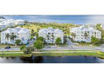 Waterfront condos offer scenic views in a well-maintained complex with lush landscaping and ample parking at 7820 34Th W Ave # 102, Bradenton, FL 34209