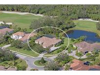 Luxury home with pool and spa, nestled in a golf course community at 10209 Discovery Ter, Bradenton, FL 34212