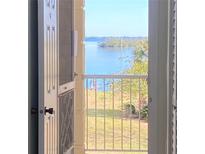 Stunning water view from condo's entryway, showcasing peaceful scenery at 3808 Gulf Of Mexico Dr # E307, Longboat Key, FL 34228