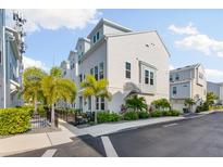 Modern townhouse exterior with landscaping at 2400 Ezzell Ct, Sarasota, FL 34237