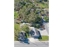 Aerial view showing commercial buildings near a road at 406 Laurel E Rd, Nokomis, FL 34275