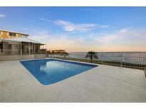 Community pool with waterfront view at 1600 W Marion Ave # 213, Punta Gorda, FL 33950