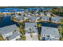 Aerial view of waterfront community with luxury homes and lush landscaping at 1005 Ibis Ct, Bradenton, FL 34209