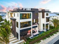 Luxury beachfront home with private pool and rooftop deck at 101 7Th S St, Bradenton Beach, FL 34217