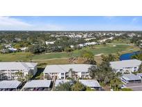 Aerial view of condo community near golf course at 431 Cerromar Ln # 446, Venice, FL 34293