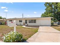 Updated single story home with a large yard and driveway at 1909 23Rd W Ave, Bradenton, FL 34205