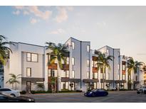 Modern townhouses with private balconies and parking at 2194 Fruitville Rd, Sarasota, FL 34237