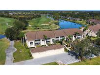 Aerial view of condo community near golf course and lake at 5281 Mahogany Run Ave # 822, Sarasota, FL 34241