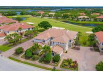 Luxury condo community boasting golf course and water views at 9435 Discovery Ter # 202D, Bradenton, FL 34212