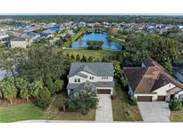 Two-story house with a lake view in a quiet community at 12941 Bliss Loop, Bradenton, FL 34211