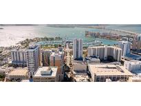 Aerial view of waterfront property, showcasing the building and marina at 1350 Main St # 1302, Sarasota, FL 34236