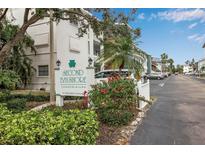 Second Bayshore Condominiums, a 55+ retirement community, features well-maintained landscaping and ample parking at 5928 Welcome Rd # H4, Bradenton, FL 34207