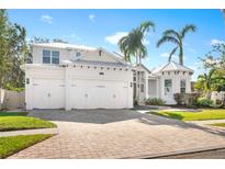 Stunning two-story home with three-car garage and a nicely landscaped yard at 1810 Wisteria St, Sarasota, FL 34239