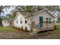 Charming single-story home with a spacious deck and lush landscaping at 8117 121St E Ave, Parrish, FL 34219