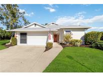 Single-story home with attached garage and landscaped lawn at 4534 Fern Dr, Bradenton, FL 34208