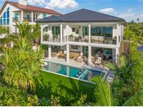 Luxury waterfront home with private pool and dock at 1707 Palma Sola Blvd, Bradenton, FL 34209
