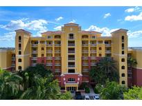 Beautiful waterfront building with a luxurious exterior at 615 Riviera Dunes Way # 104, Palmetto, FL 34221