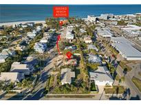 Aerial view showing home's location near beach access at 128 51St St # A, Holmes Beach, FL 34217