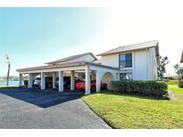 Covered carport with space for multiple vehicles at 1783 Lake Pl # 1783B, Venice, FL 34293