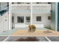 Condo building exterior, showing the entrance to unit 1853 at 1853 Restful Dr # L2, Bradenton, FL 34207